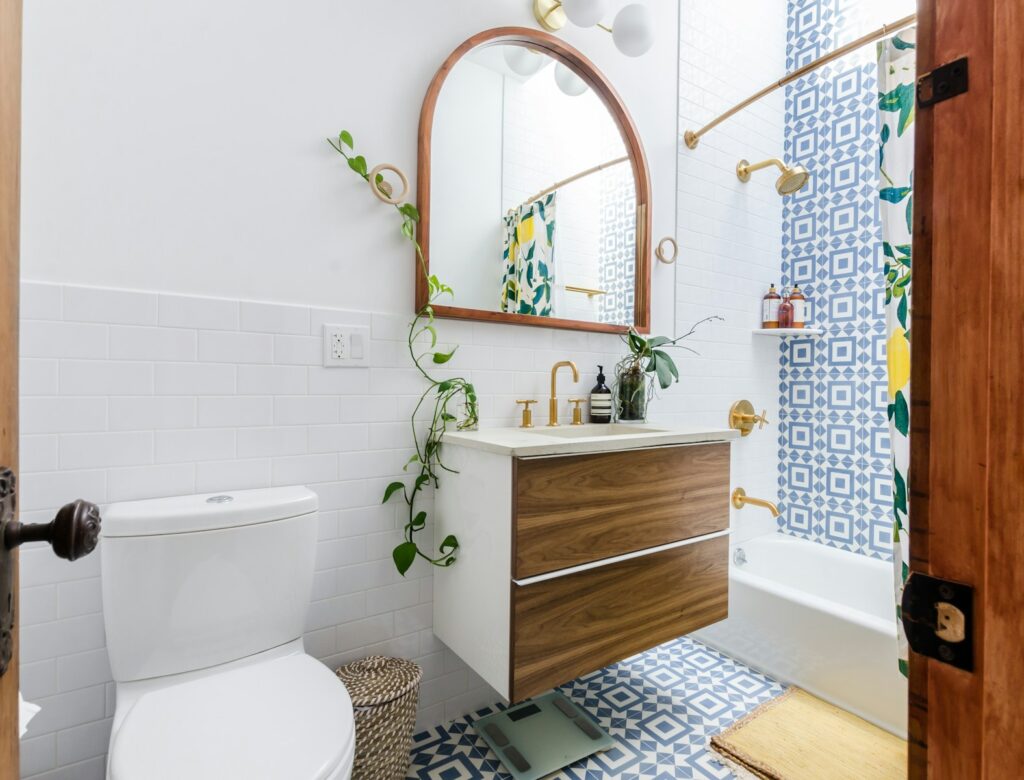 Bathroom renovation vs. remodeling comparison with updated fixtures and layouts.